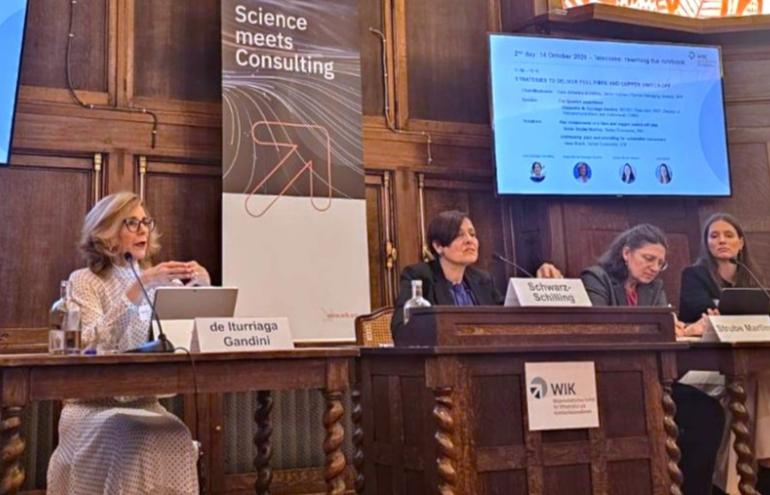 The image shows Alejandra de Iturriaga Gandini at the WIK conference 2026.