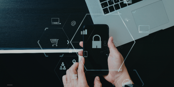 The image shows a person holding a mobile phone in both hands. Icons, such as a lock, are displayed across the image.