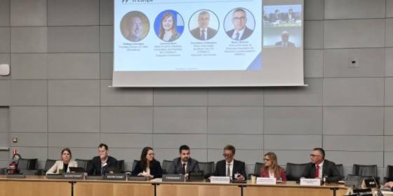 The image shows BEREC Chair Marko Mismas, alongside other panelists, at the OECD event on 6 May 2026.