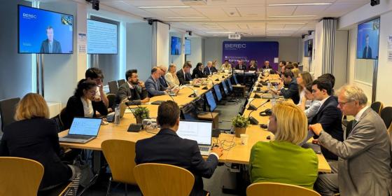The image shows the BEREC pubic debriefing event, taking place on 10 June 2026 at the IRG Secretariat in Brussels, Belgium.