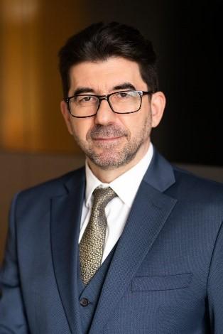 The image shows Laszlo Igneczi, current BEREC Office Director