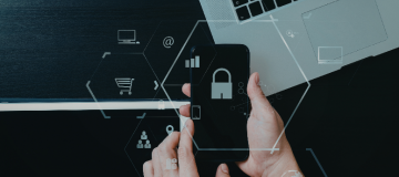 The image shows a person holding a mobile phone in both hands. Icons, such as a lock, are displayed across the image.