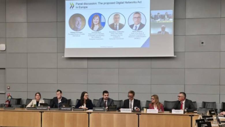The image shows BEREC Chair Marko Mismas, alongside other panelists, at the OECD event on 6 May 2026.