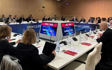 The image shows the participants of the BEREC-GSMA meeting at the World Mobile Congress 2025.