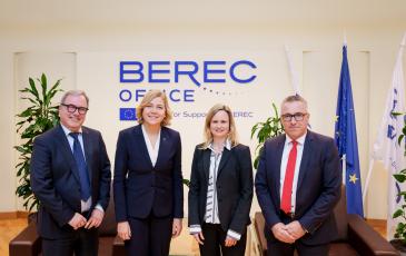 The image shows the Executive Vice-President of the European Commission Henna Virkkunen, BEREC Chair Robert Mourik (ComReg, Ireland), incoming BEREC Chair Marko Mismas (AKOS, Slovenia), and BEREC Office Director Verena Weber.