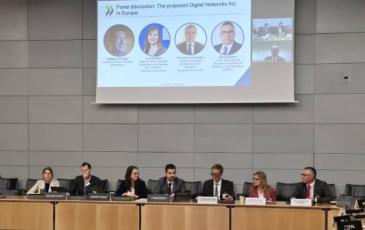 The image shows BEREC Chair Marko Mismas, alongside other panelists, at the OECD event on 6 May 2026.