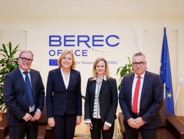 The image shows the Executive Vice-President of the European Commission Henna Virkkunen, BEREC Chair Robert Mourik (ComReg, Ireland), incoming BEREC Chair Marko Mismas (AKOS, Slovenia), and BEREC Office Director Verena Weber.