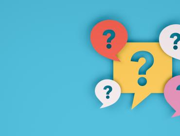 The image shows question marks on a colored background.