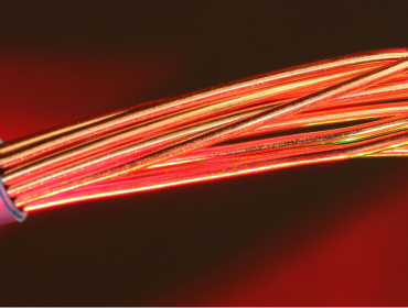 The image shows multiple copper cables.