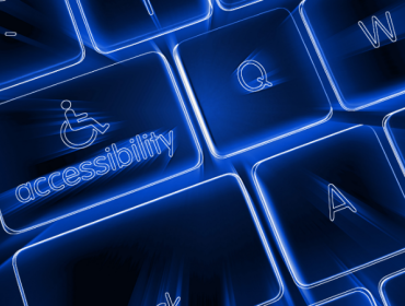 The image shows a keyboard with one of the buttons including the word "accessibility".