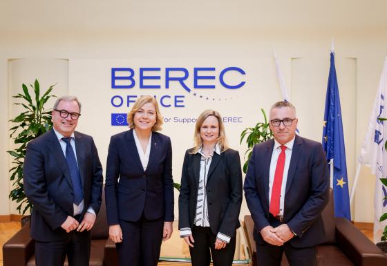The image shows the Executive Vice-President of the European Commission Henna Virkkunen, BEREC Chair Robert Mourik (ComReg, Ireland), incoming BEREC Chair Marko Mismas (AKOS, Slovenia), and BEREC Office Director Verena Weber.