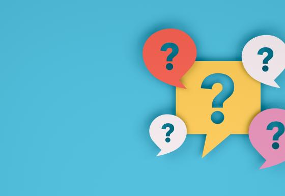 The image shows question marks on a colored background.