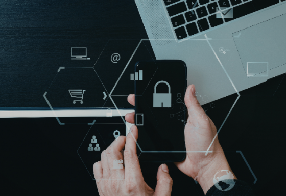 The image shows a person holding a mobile phone in both hands. Icons, such as a lock, are displayed across the image.