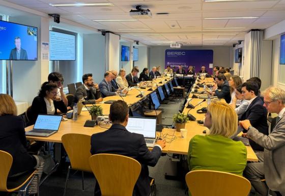 The image shows the BEREC pubic debriefing event, taking place on 10 June 2026 at the IRG Secretariat in Brussels, Belgium.